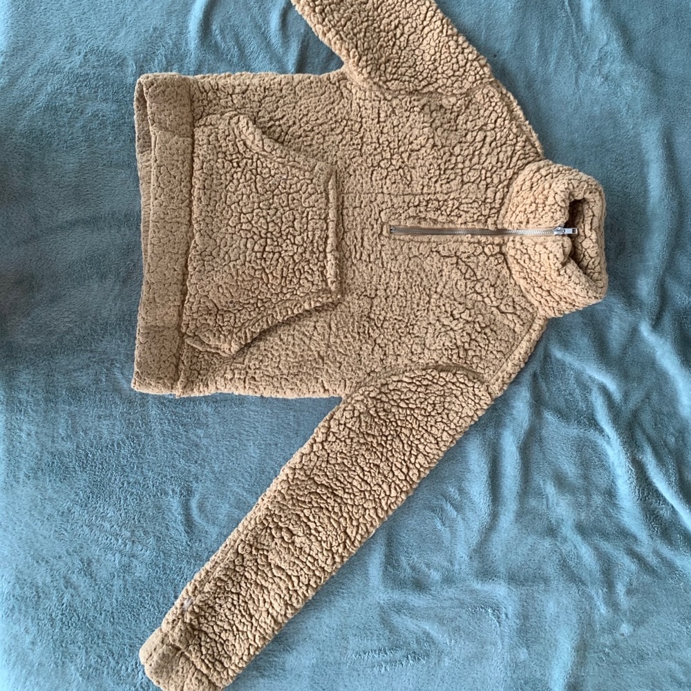 Brownish tan puffy fuzzy jacket